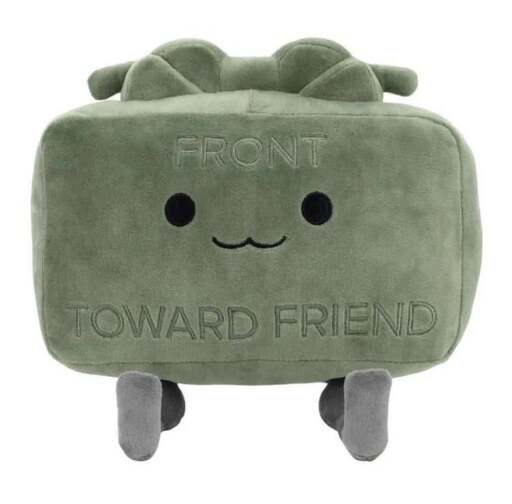 A picture of a claymore plush toy with the text "FRONT TOWARD FRIEND".