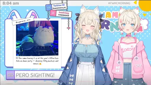 a picture of two dog vtubers with a picture on their morning stream with a blahaj