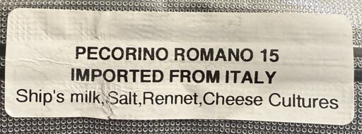 Photograph of a food label that says: PECORINO ROMANO 15, IMPORTED FROM ITALY. It lists the ingredients as: Ship's milk, Salt,Rennet,Cheese Cultures