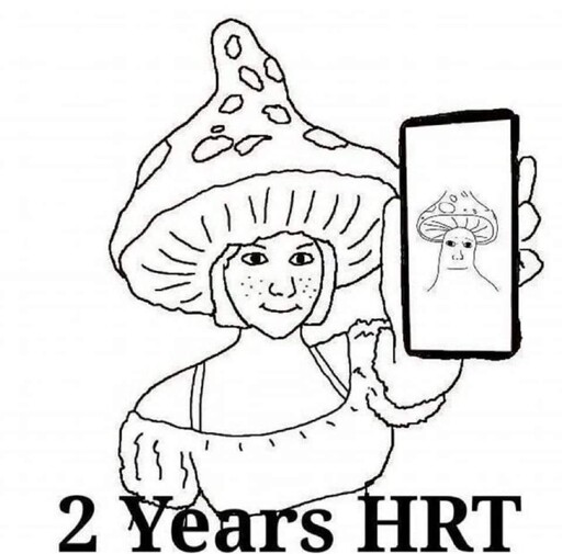 image of shroomjak, but she's a her. she's holding up a phone with an image of original shroomjak. caption says "2 years HRT"